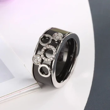 HUADIE moterų žiedas pagamintas iš keramikos baltos ir juodos spalvos. bižuterijos 2021